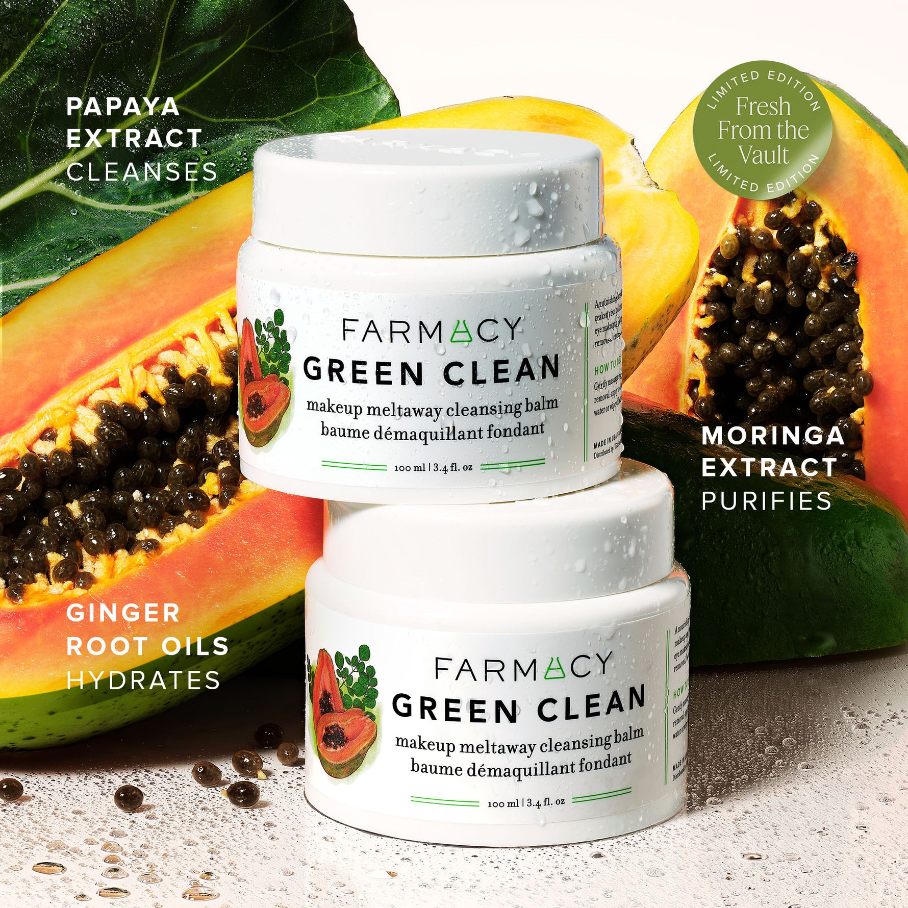 Two jars of Farmacy Green Clean makeup balm with papaya and moringa ingredients displayed.