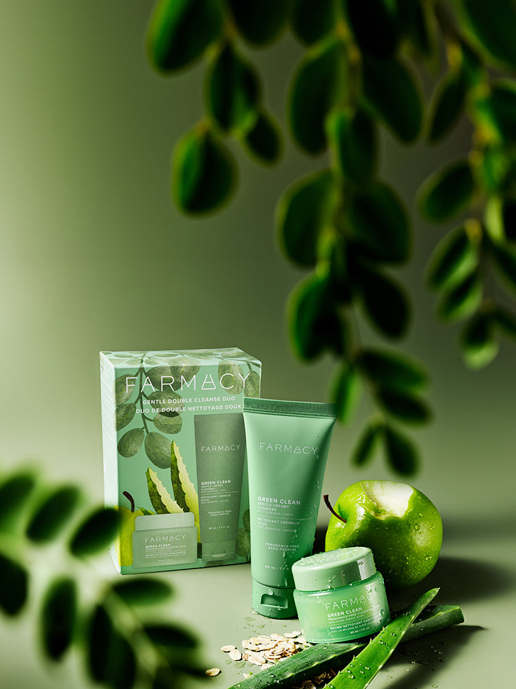 Farmacy Green Clean skincare products including a jar, tube, and box on a green background