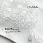 Close-up of a gel with bubbles and text describing its scent.