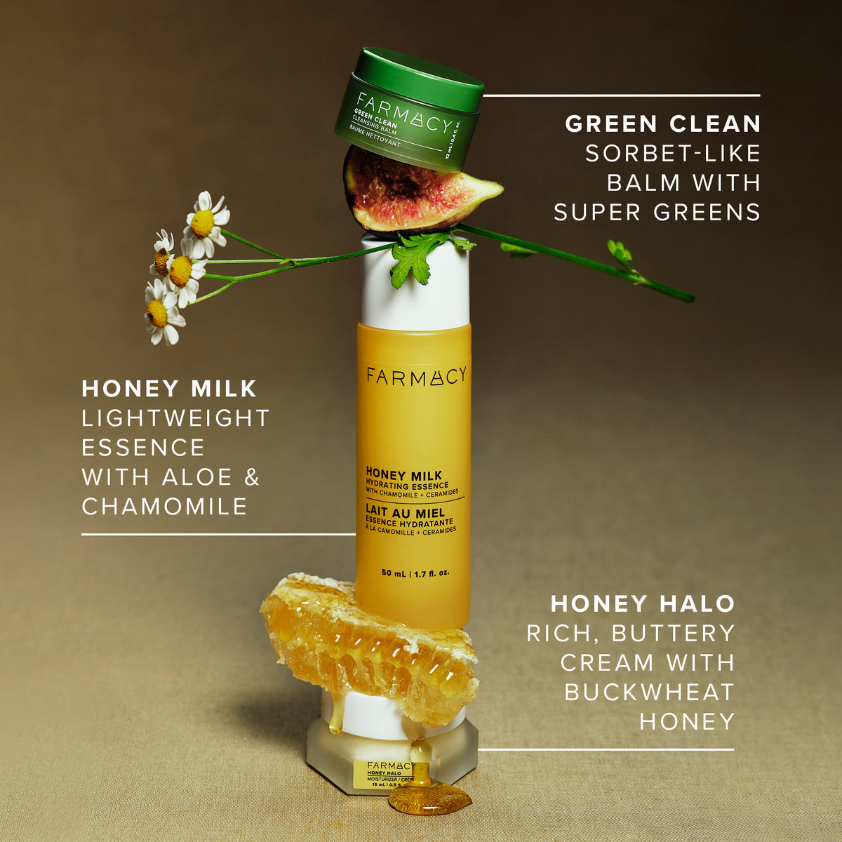 Farmacy Green Clean Makeup Meltaway Cleansing Balm 15 mL (0.5 fl. oz.), Honey Milk Hydrating Essence 50 mL (1.7 fl. oz.), and Honey Halo Ultra-Hydrating Ceramide Moisturizer 15 mL (0.5 fl. oz.) arranged with fig, chamomile, and honey to highlight key ingredients