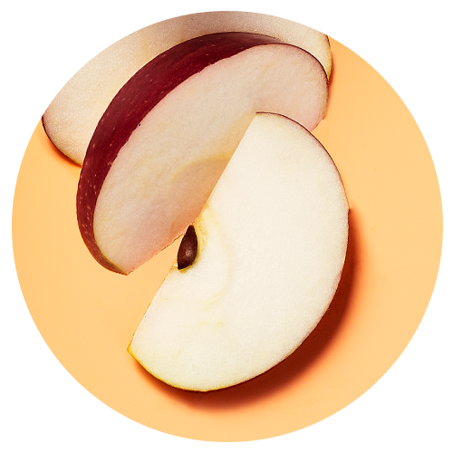 Close up image of an apple cut in half