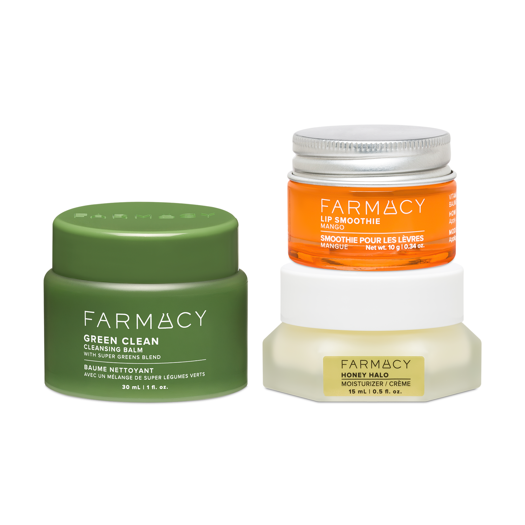 Three Farmacy skincare products arranged on a white background: a green jar of Green Clean Cleansing Balm 30ml, an orange jar of Mango Lip Smoothie 10g with a silver lid, and a white jar of Honey Halo Moisturizer  15mLwith a gold label.