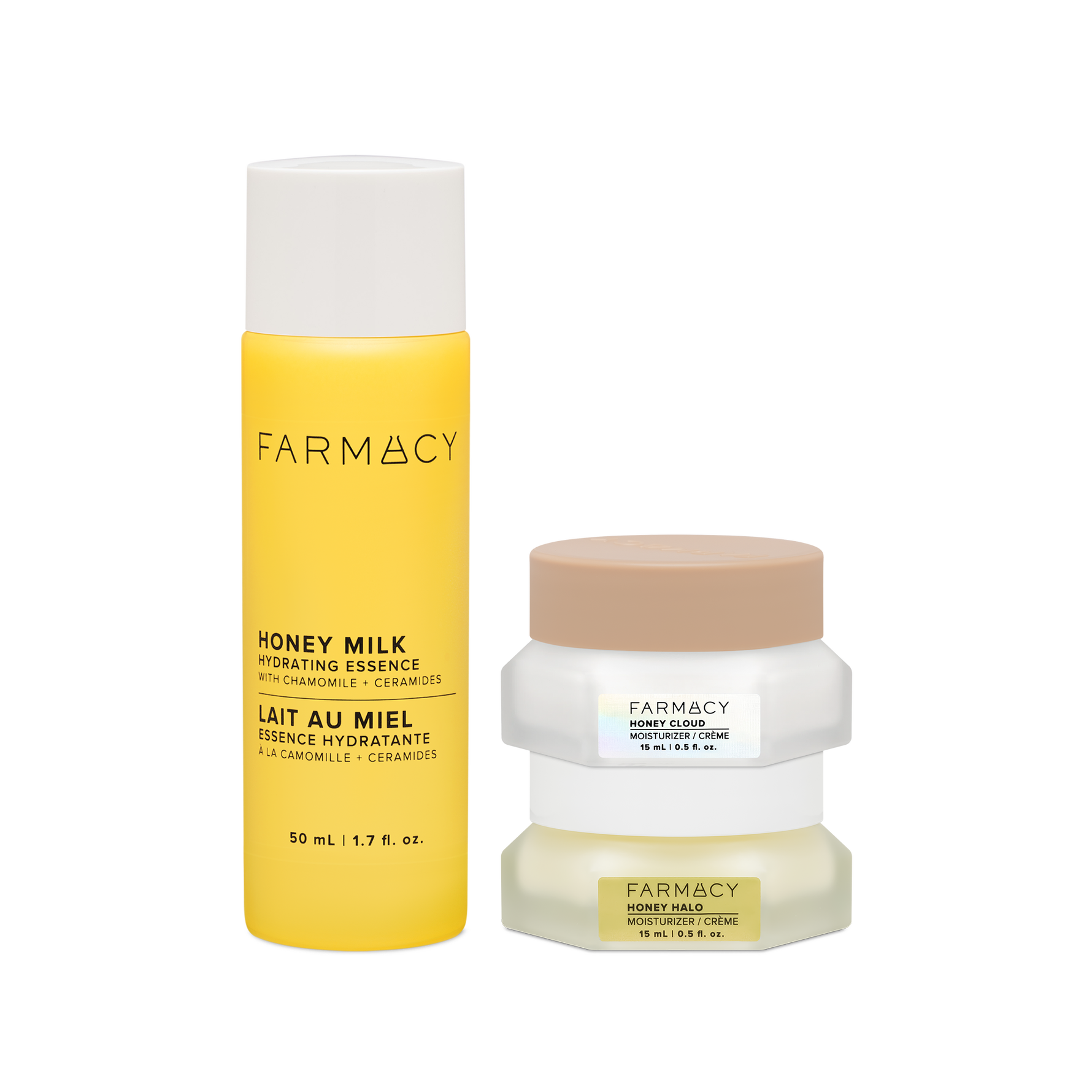 Farmacy Honey Barrier Trio featuring a 50 mL bottle of Honey Milk Hydrating Essence, a 15 mL jar of Honey Cloud Moisturizer and a 15 mL jar of Honey Halo Moisturizer on a white background