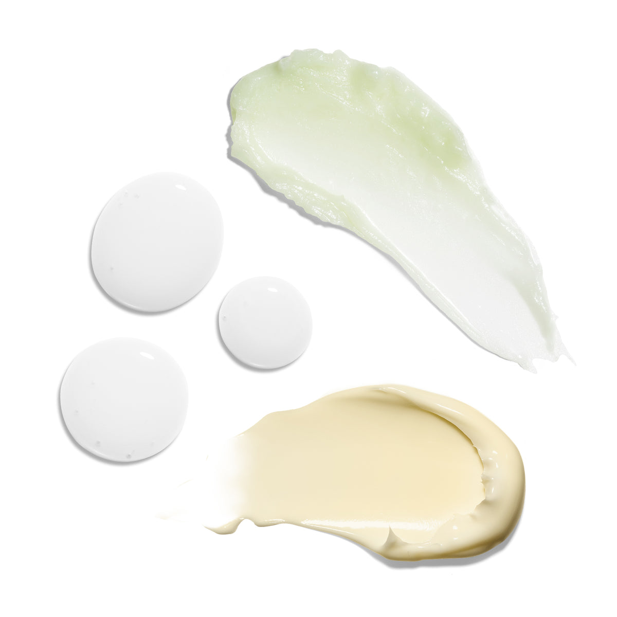 Three Farmacy Barrier Basics Kit skincare textures: a translucent green balm swipe, white liquid essence drops, and a rich pale cream swipe on a white background
