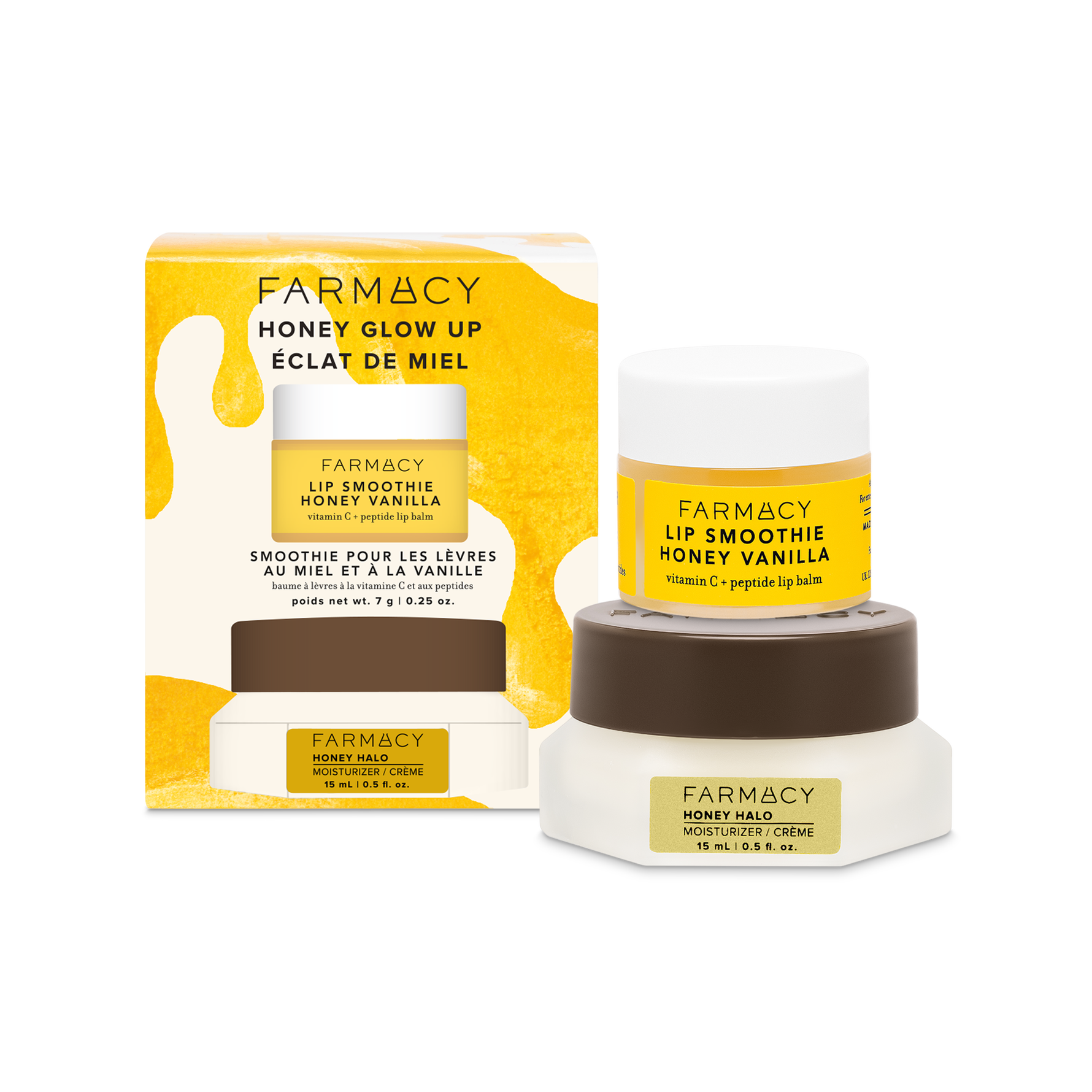 Farmacy Honey Glow Up Kit box next to 10 g jar of Honey Vanilla Lip Smoothie and 15 mL jar of Honey Halo Moisturizer on a white background