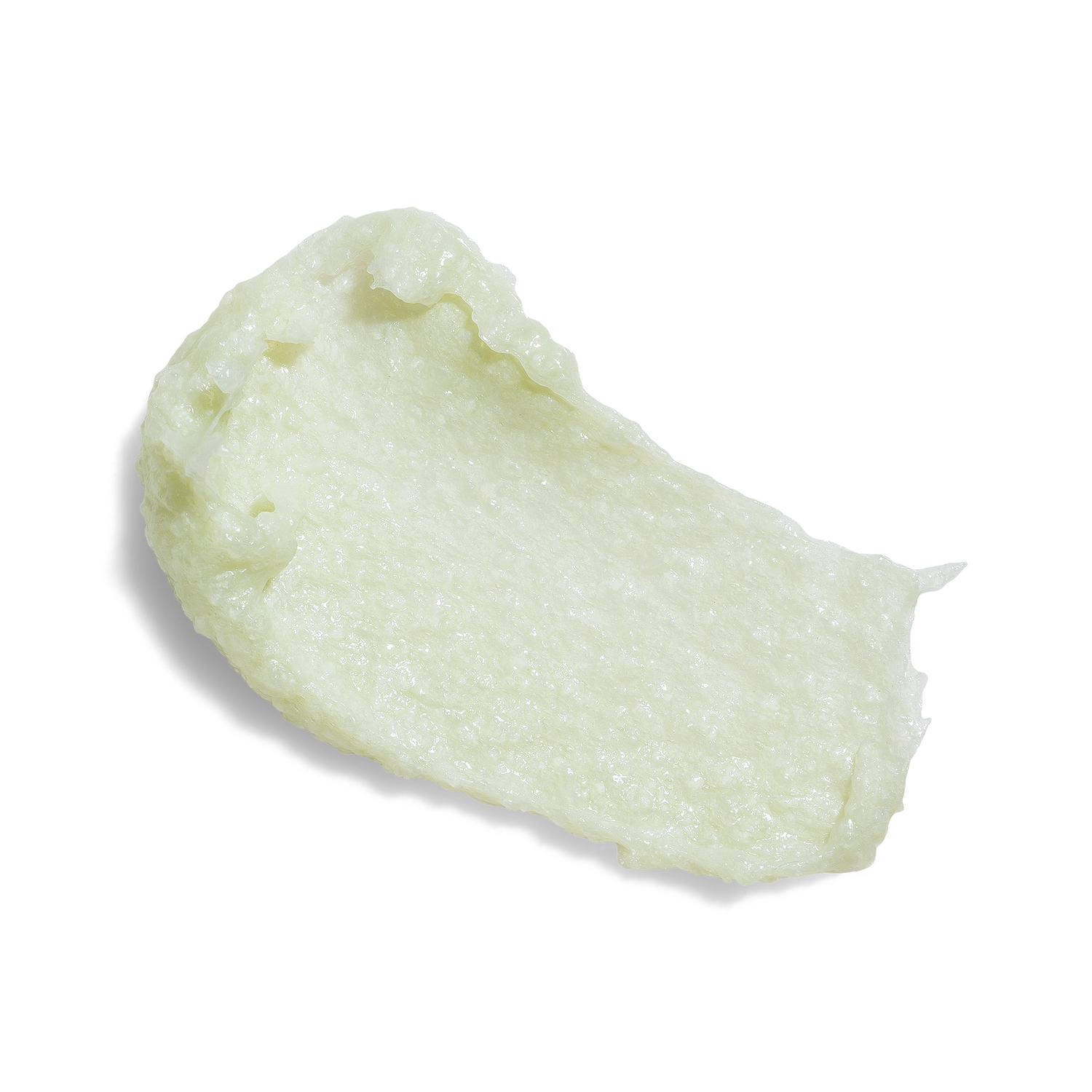 A dollop of Farmacy Green Clean Whipped Foaming Cleanser on a white background