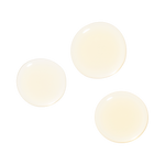 Droplets of Farmacy Honey Essence on white background