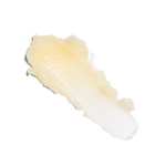 A smear of Honey Vanilla Green Clean Cleansing Balm on a white background