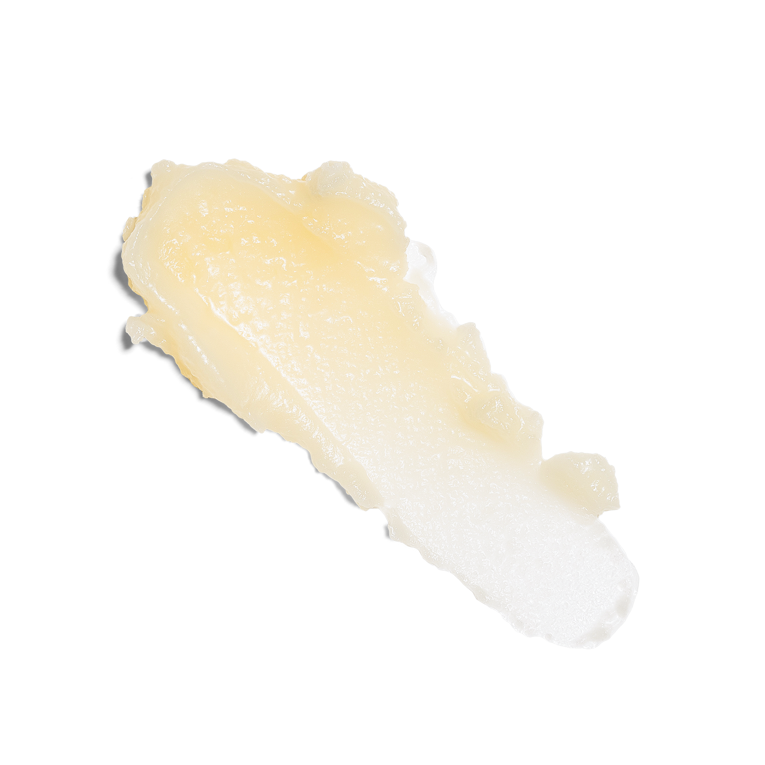A smear of Honey Vanilla Green Clean Cleansing Balm on a white background