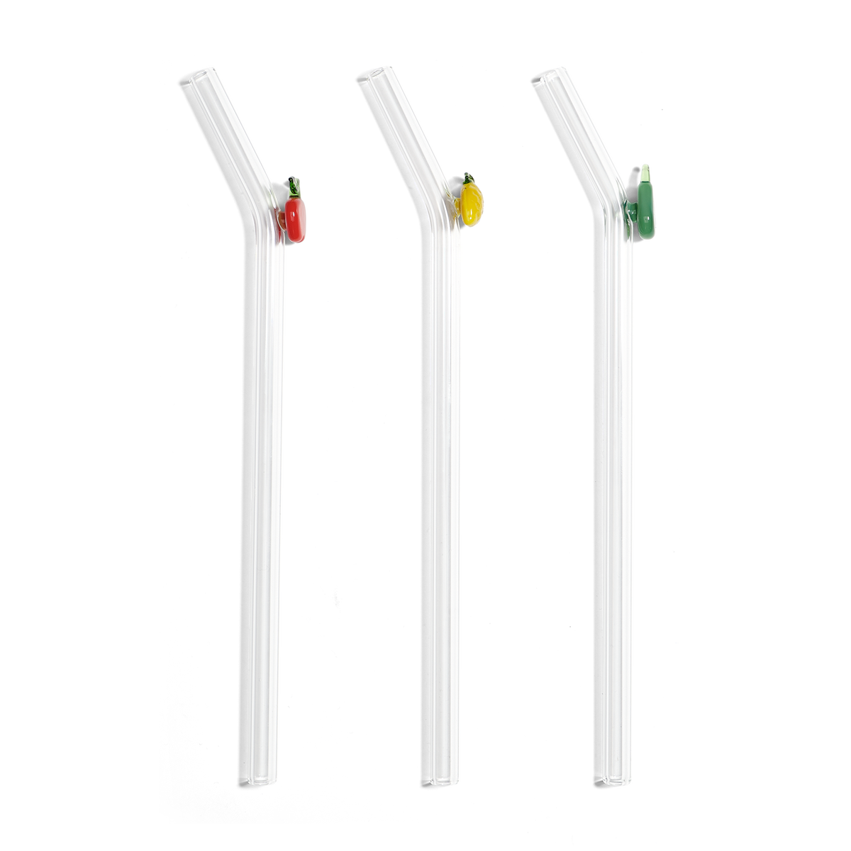 Three three reusable bent glass straws with colorful decorative charms on a white background