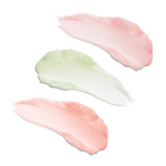 Three Green Clean Cleansing balm swatches on a white background: two soft pink swatches and one pale mint green swatch.