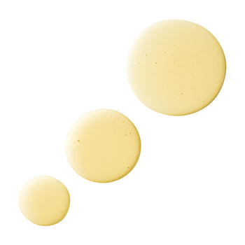 Farmacy's Honey Bubbly body wash pumped out into three circles on a white background