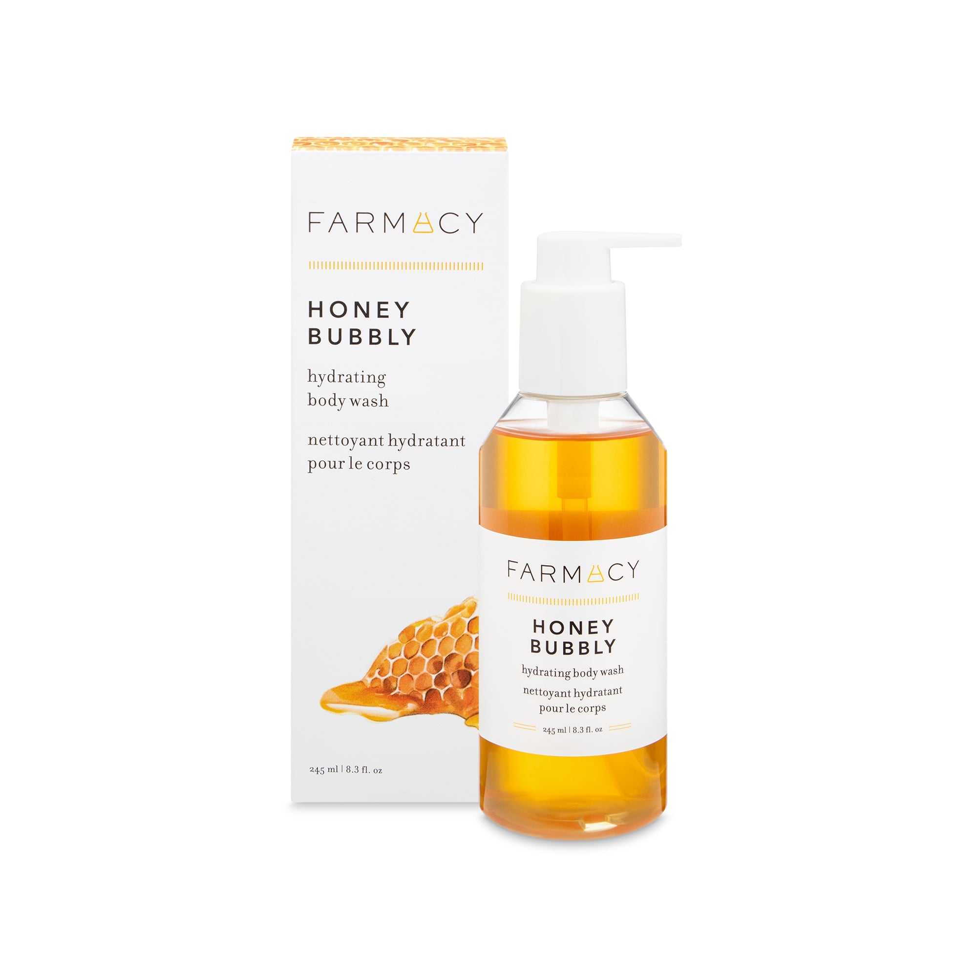 A box and bottle of Farmacy's Honey Bubbly body wash side by side