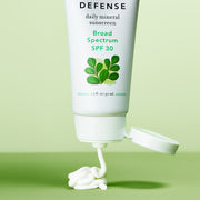 Green Defense close up with product smear